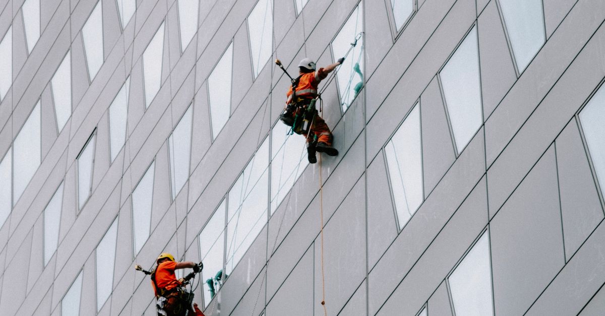 Integrating Ladder Techniques with Modern Window Cleaning Tools